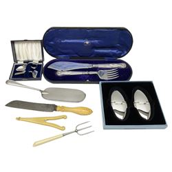 Cased pair of Wedgwood silver-plate book stands, silver-plate baby feeding spoon and pusher in box, other silver-plated cutlery