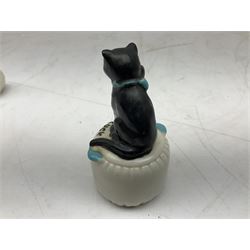 Five crested ware Good Luck black cats, comprising two Willow Art examples, two Arcadian examples and one Carlton China, to include Bridlington, Hull, Filey, etc, tallest H9cm