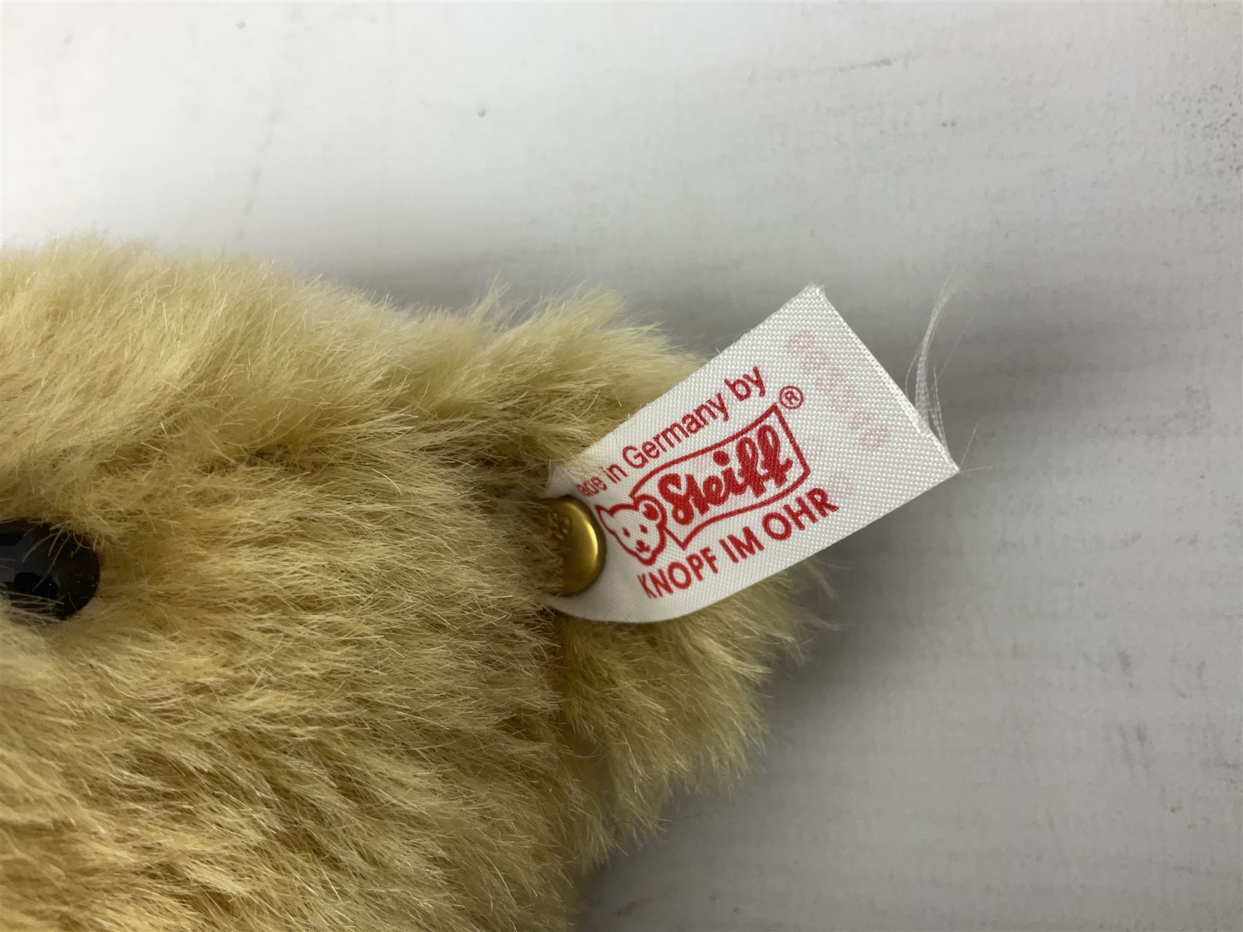 Two Steiff teddy bears comprising 2006 'Bear of the Year', limited edition with original dust bag and certificate, and 'Big Foot Bear' serial no. 002939, both with tags in ear