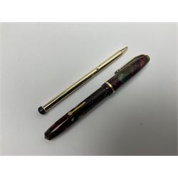 Three fountain pens, to include Conway Stewart 'Dinkie 550' and 'Conway 57' and a Parker 'Slimfold', all with 14ct gold nibs, together two roller ball pens, including a Parker example and a Swarovski Crystal paperweight