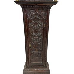18th-century profusely carved oak longcase clock - with a pagoda pediment, upstands and carving, 
 break arch hood door flanked by reeded pilasters with brass capitals, trunk with canted corners and a spire topped door, square plinth with applied skirting, break arch brass dial with wheatsheaf engraving and cast cherub and crown spandrels, engraved break arch with the London clockmakers name John Gordin, silvered chapter ring with Roman numerals, five minute Arabic's, minute and quarter hour tracks, matted dial centre with ringed winding holes, square date aperture and seconds ring, dial pinned to a five pillar movement with inside countwheel striking, striking the hours on a cast bell. With weights and pendulum. John Gordin, is possibly a mis-spelling or phonetic spelling of John Gordon, of London, who worked from Ludgate Street in the parish of St. Gregory by St. Pauls. Apprenticed in 1689 and died in 1732 when his will was proven.
