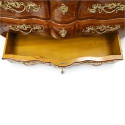Colombo Mobili - Italian Louis XV design kingwood and marquetry bombé commode chest, the shaped marble top with moulded edge, fitted with an assortment of three shaped short drawers over two long, each with parquetry veneered facias and rocaille shaped gilt metal handles and escutcheons, flanked by gilt metal cartouche mounts with scroll and foliate detail, shaped apron on splayed bracket feet