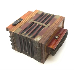  Early 20th century German ten-button accordion with simulated wood grain finish, the metal mounts with crossed flaming torches makers mark W27cm  