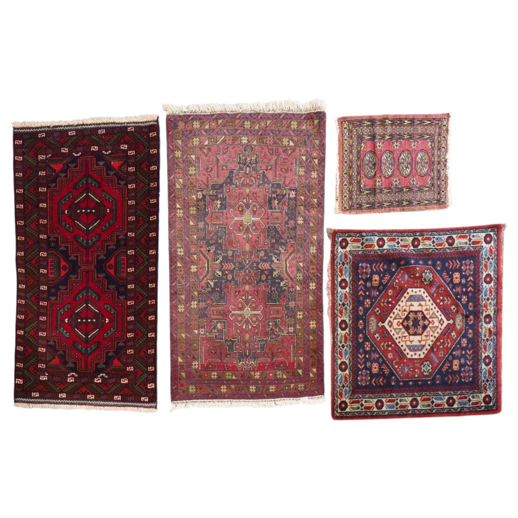 Four small Persian and Caucasian design rugs, comprising a Kazak rug with twin hooked medallions on a red ground, Baluchi rug with geometric motifs on a muted red ground, Shiraz rug with a central ivory and red medallion on a blue ground, and a Bokhara mat with four guls on a rose ground, each enclosed by geometric borders, largest 143cm x 88cm (4)