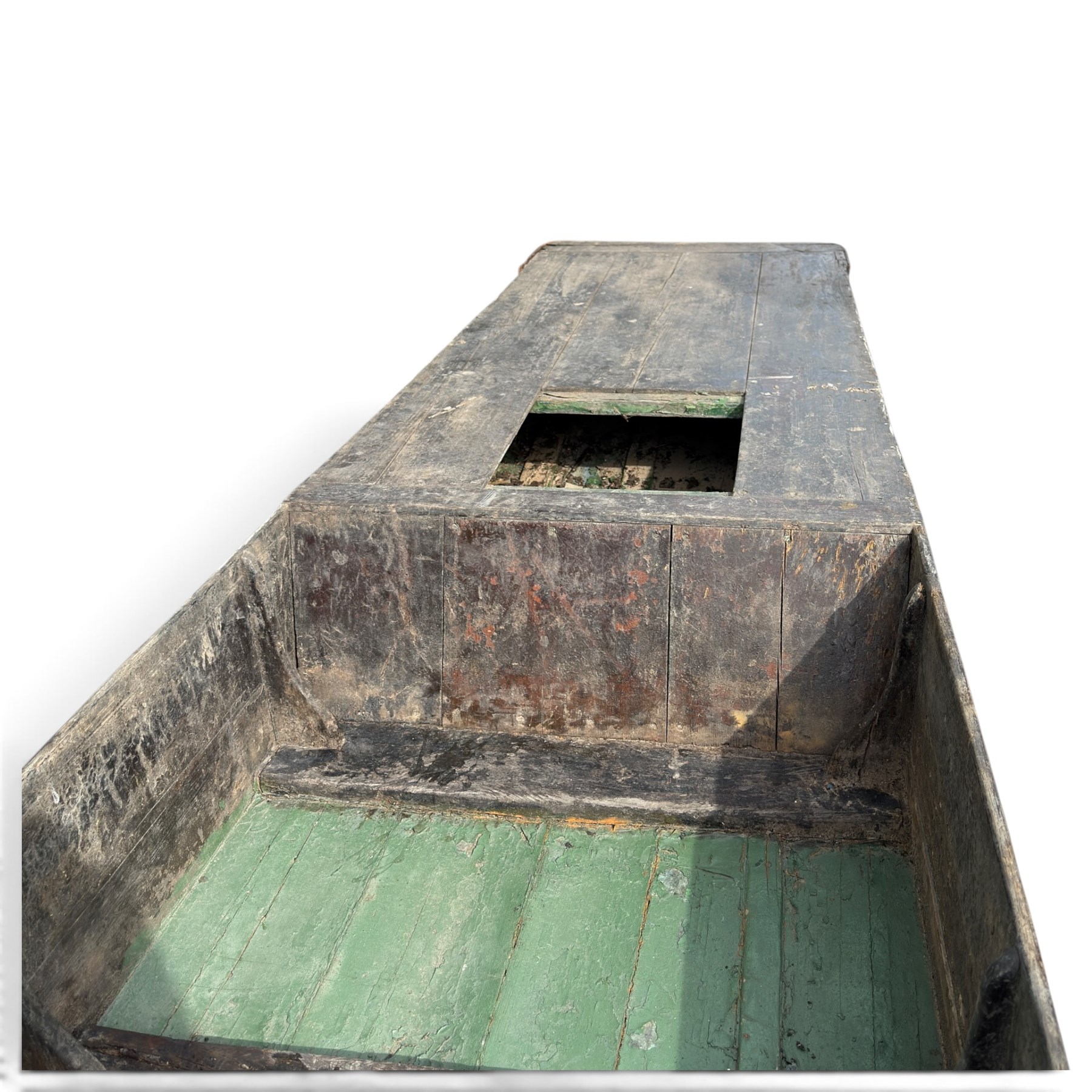 Large early 20th century plank-built wooden river punt, the long tapering hull with enclosed fore and aft decks, open green-painted ribbed interior, together with two paddles