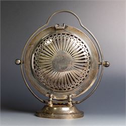 Indian silver folding cake stand, of circular form with pierced decoration, loop handle and circular foot, when folded H18cm