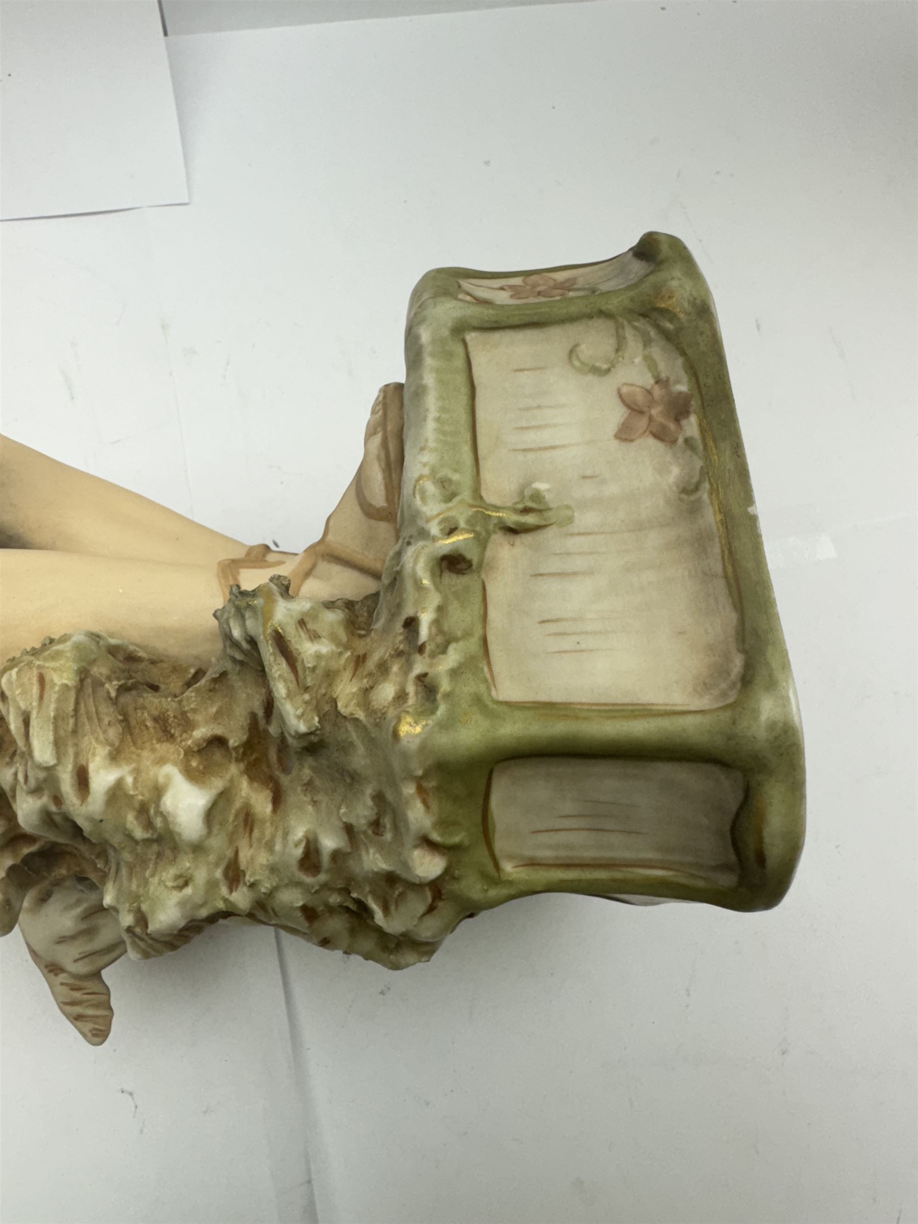 Pair of Royal Dux figures, no. 1115, modelled as a shepherd with a goat by his side and a shepherdess feeding a lamb, each wearing flowing green and pink robes with gilt detailing, with pink triangle mark beneath, H51cm