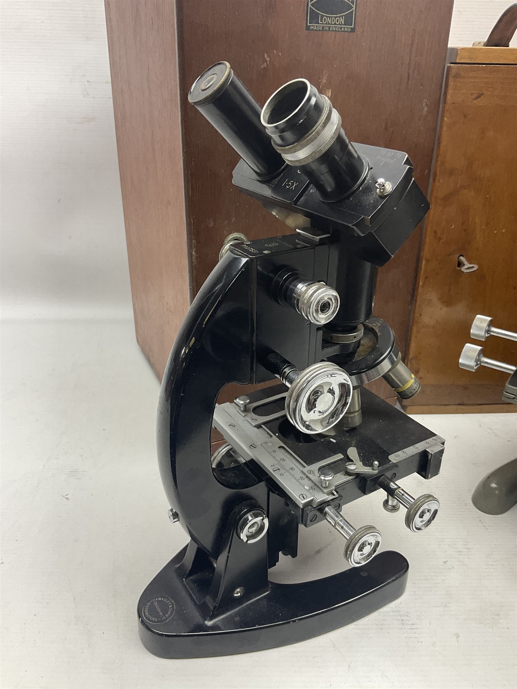 Four microscopes, including Cooke, Troughton & Simms no M467926, W Watson & Sons no 114758, W & J George & Beck Ltd no 36649 and one other 