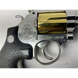 Early 20th century Flobert 5mm blank firing revolver with six-shot chamber, top venting, nickel plated with folding trigger No.118 L12.5cm overall; replica non-firing 'British Bulldog' revolver; and Windproof gas lighter inscribed 'Revolver-99 Spring and Autumn' in holster marked 'Star-Line'