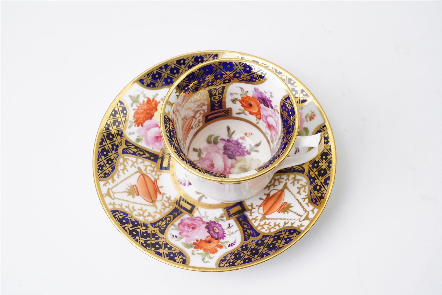Grainger Lee & Co Worcester teacup, together with a collection of cobalt blue cabinet cups and saucers,  including a Royal Doulton hand-painted example by E Percy, and various others 19th century and later, mostly unmarked (7 pairs)