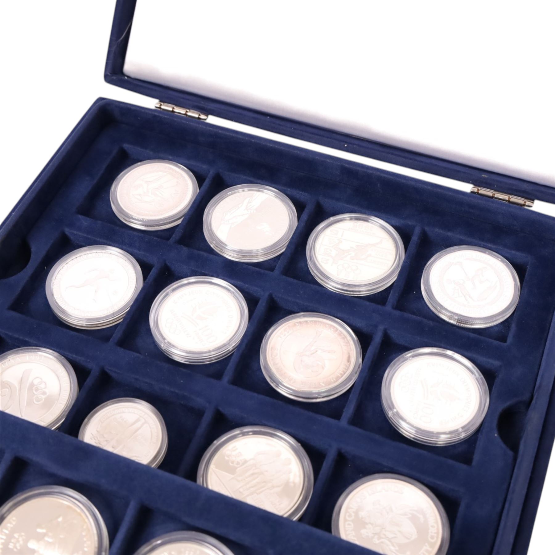 'The Olympic Commemorative Coin Collection', set of thirty-six silver proof coins, various countries and denominations, boxed