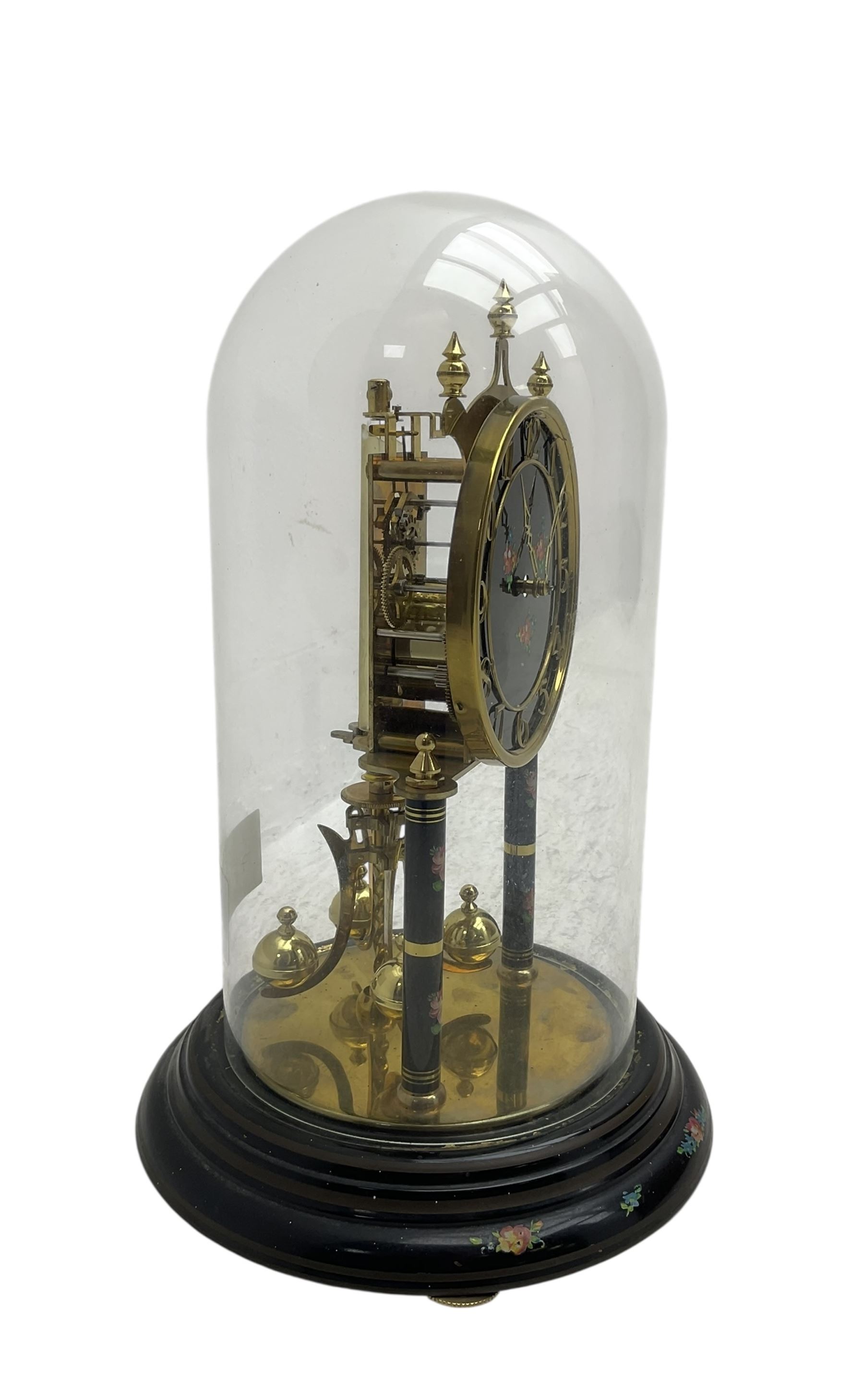 Kundo 1960's torsion clock with a skeleton movement and four ball