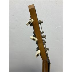 1950s acoustic guitar with f-holes and pickguard L105cm; black fur lined hard carrying case