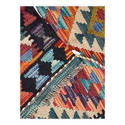 Afghan Maimana flatweave Kilim rug, the field decorated with multi-coloured diamond motifs in a stepped formation, framed by a bold hourglass border,