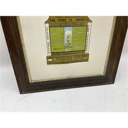 Religious print depicting a grandfather clock with colourful sacred texts from the book of revelations, and religious tects, in wood frame, L93cm