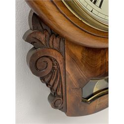 19th century mahogany cased drop dial wall clock, circular Roman dial signed 'J. Phillips, Rugby', figured lower section with scroll and foliage carved brackets