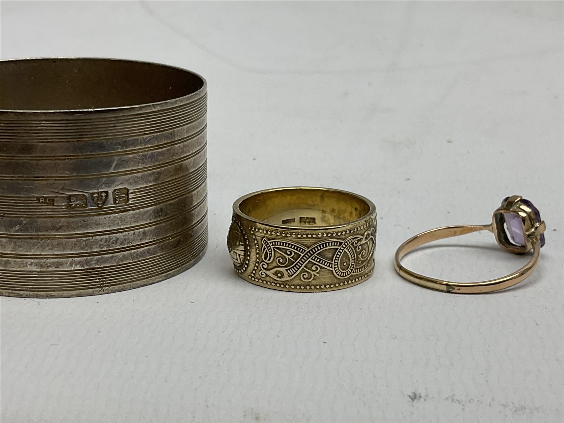9ct gold stone set ring, silver napkin ring hallmarked Chester and a hallmarked silver gilt ring