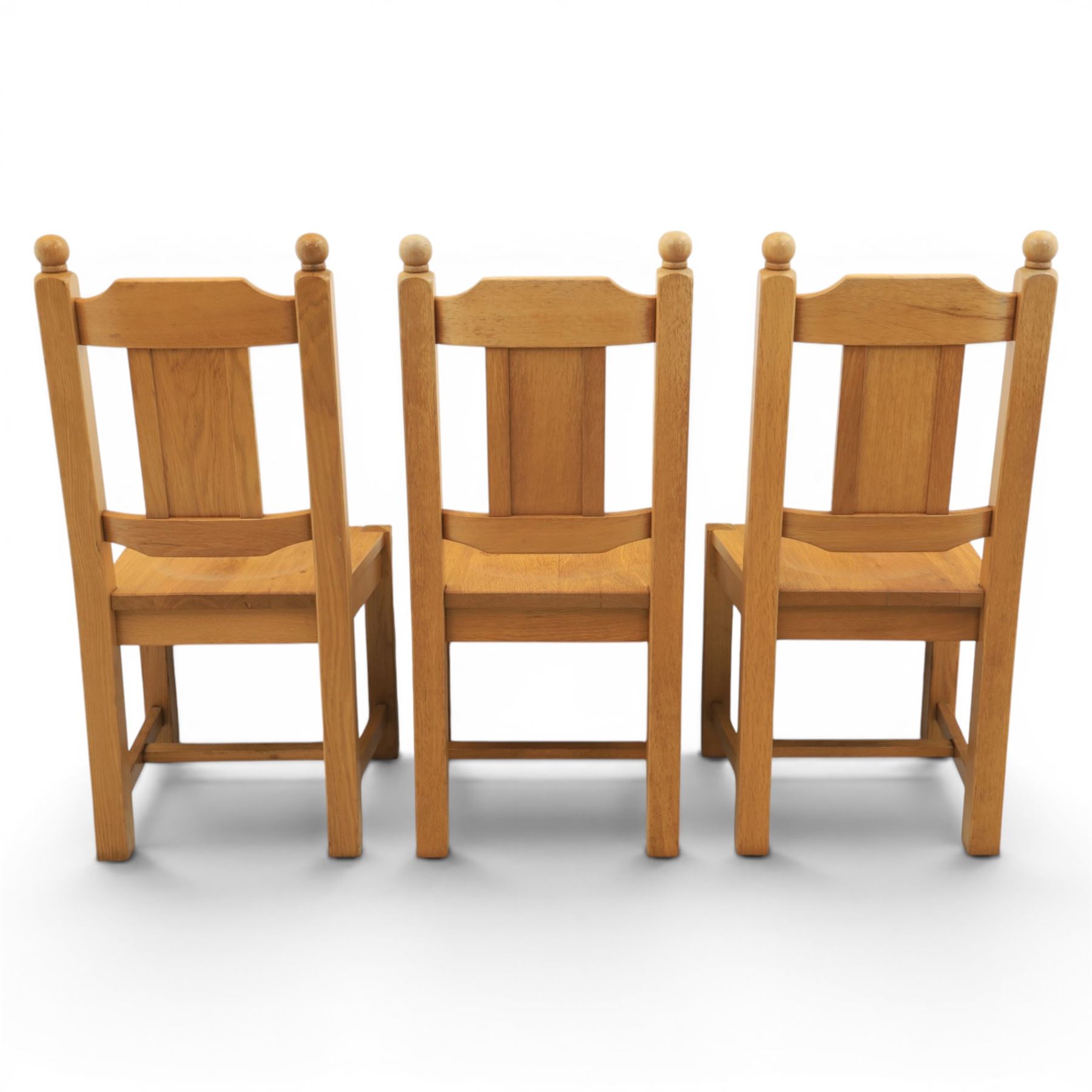 Contemporary solid oak dining table, and set of eight chairs, rectangular plank top with chamfered edges, raised on square supports
