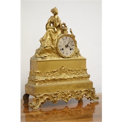  Late 19th century French gilt metal figural mantel clock with seated female figure and circular silvered dial, modern movement, H38cm  