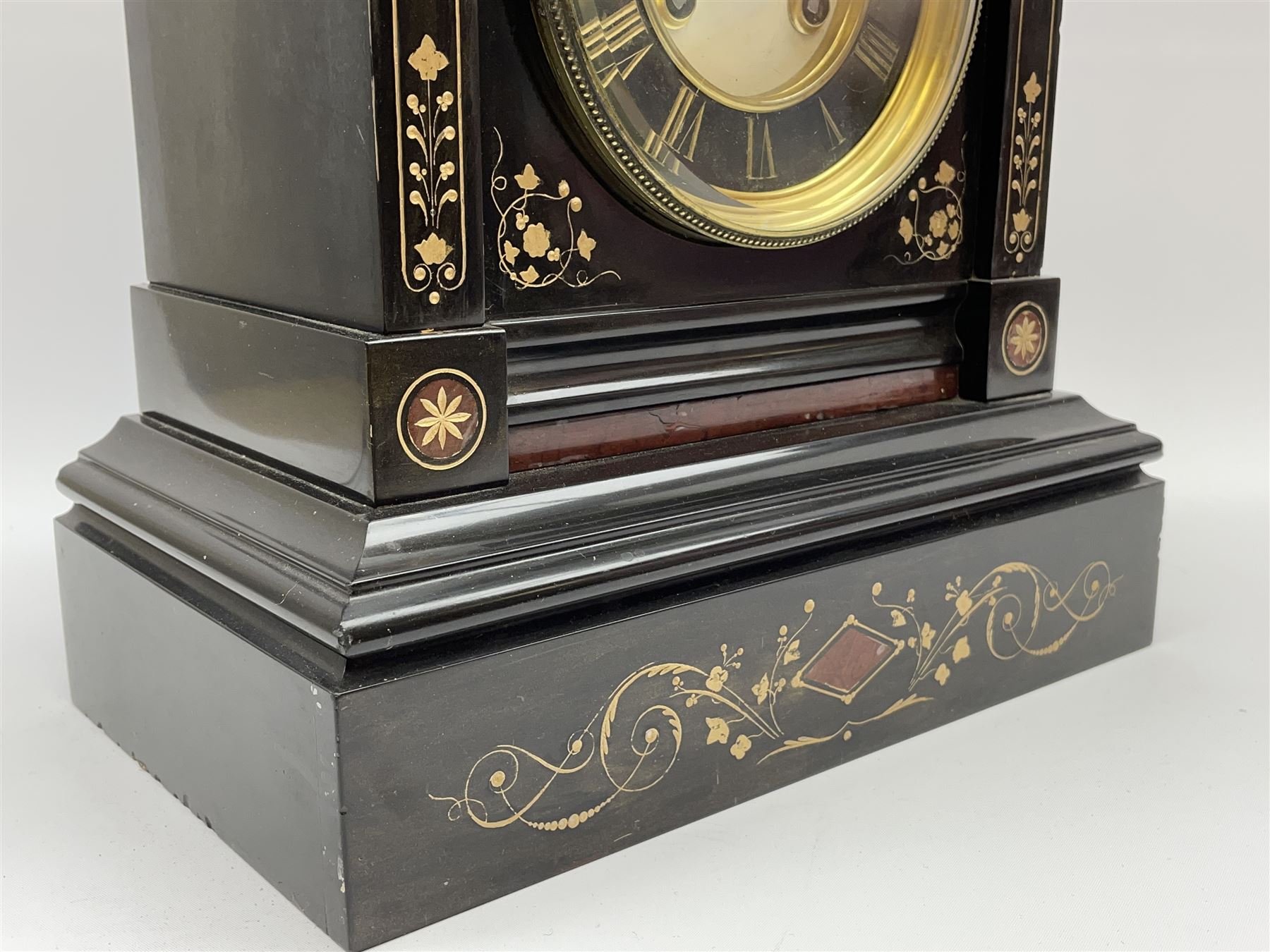 Victorian black slate cased mantel clock, with rouge marble, engraved and gilt decoration, circular dial with Roman chapter ring, twin train eight day movement with brocot escapement, striking the hours and halves on bell, the movement back plate stamped 'B.R 39549 498'