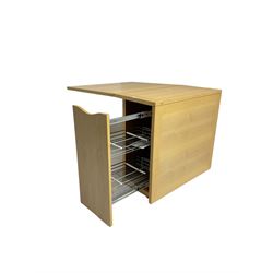 Skovby - 'SM101' drop leaf dining table, fitted with concealed storage compartment 