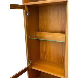 Nathan - teak wall display cabinet, enclosed by three glazed doors, fitted with four drawers and three cupboards 