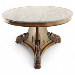 French mid-19th-century Second-Empire mahogany centre table with a dished grey-veined marble top, on a tapered triform pedestal with anthemion brass mounts above carved recumbent swan figures with delicately refined wings and graceful necks curving backwards, associated with the Empress Josephine, raised on three small platform bases
