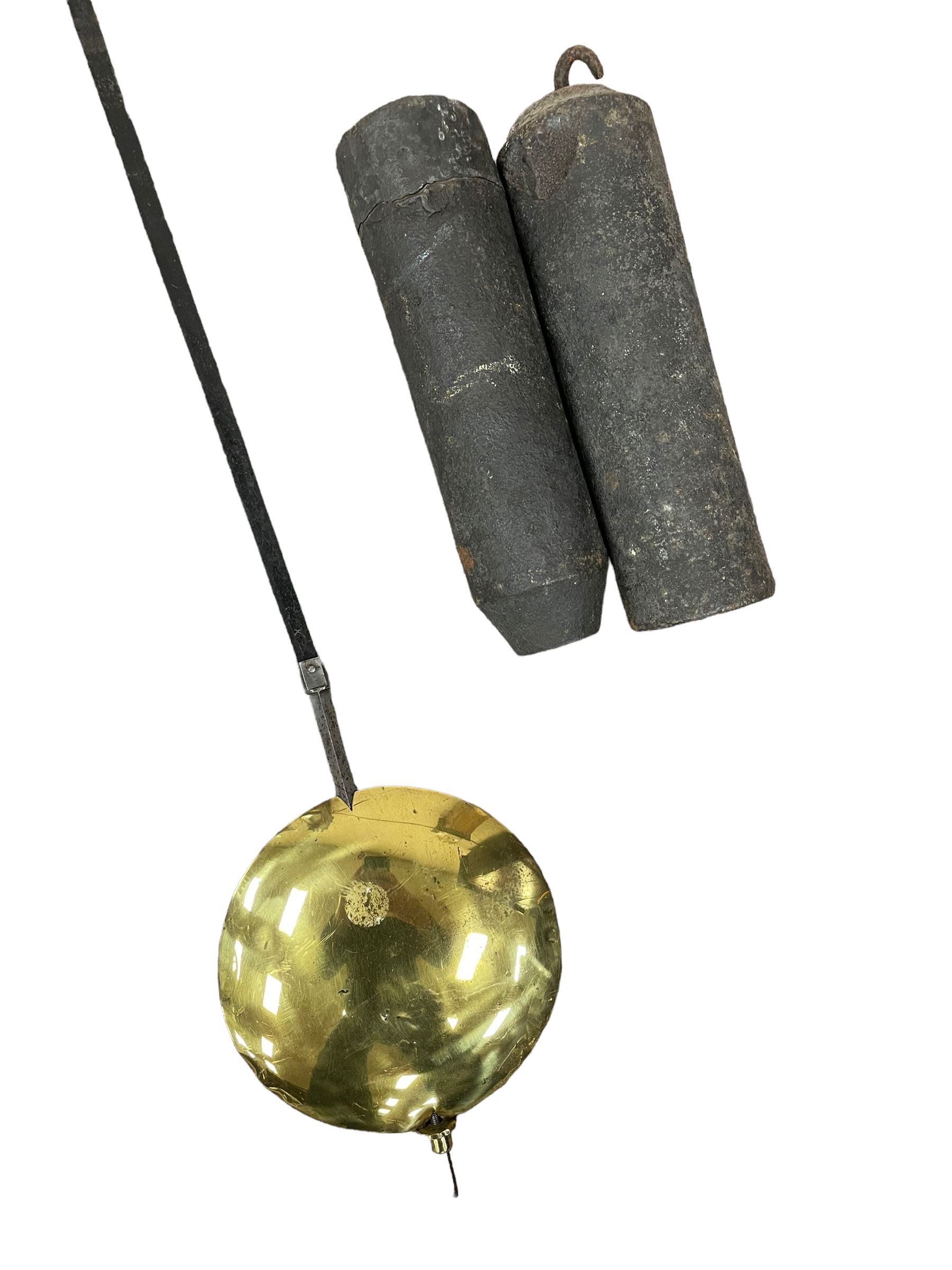 Henry Hindley of York – mid-18th century oak cased 8-day longcase clock,
flat topped caddy pediment with gesso finials, rectangular hood door flanked by wooden turned pilasters with capitals, canted trunk with a full-length break arch topped door on a short plinth with applied skirting and bracket feet, brass dial with a silvered chapter ring, Roman numerals and five-minute Arabic’s, minute and inner quarter hour tracks, matted dial centre with subsidiary seconds dial, blued steel hands and female head pattern spandrels, silvered calendar dial to the break arch with dolphin spandrels, four pillar rack striking movement, striking the hours on a bell. With weights and pendulum. 
H250 W48 D27
Henry Hindley originally from Wigan (Lancs) is recorded as working in York from Petergate 1731-41 then Stonegate 1741-1771. A famous and highly innovative maker, often referred to as the “Tompion of the North.” 
