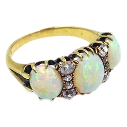  Victorian gold three stone opal and eight stone diamond ring, stamped 18c  