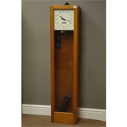  Gents' of Leicester teak cased electric master clock with pendulum, enclosed by glazed door, Arabic dial, dial labelled 'Reliance', H129cm  