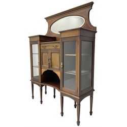 Edwardian inlaid mahogany break-front mirror back side cabinet, dentil cornice over bevelled oval mirror plate, fitted with single drawer and double cupboard over under-tier flanked by two glazed cabinets, decorated with all-over satinwood banding, on square tapering supports with spade feet