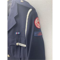 1950s British Red Cross North Yorkshire dress uniform comprising tunic, trousers, greatcoat and visor cap; bears manuscript label '1956 Ware'