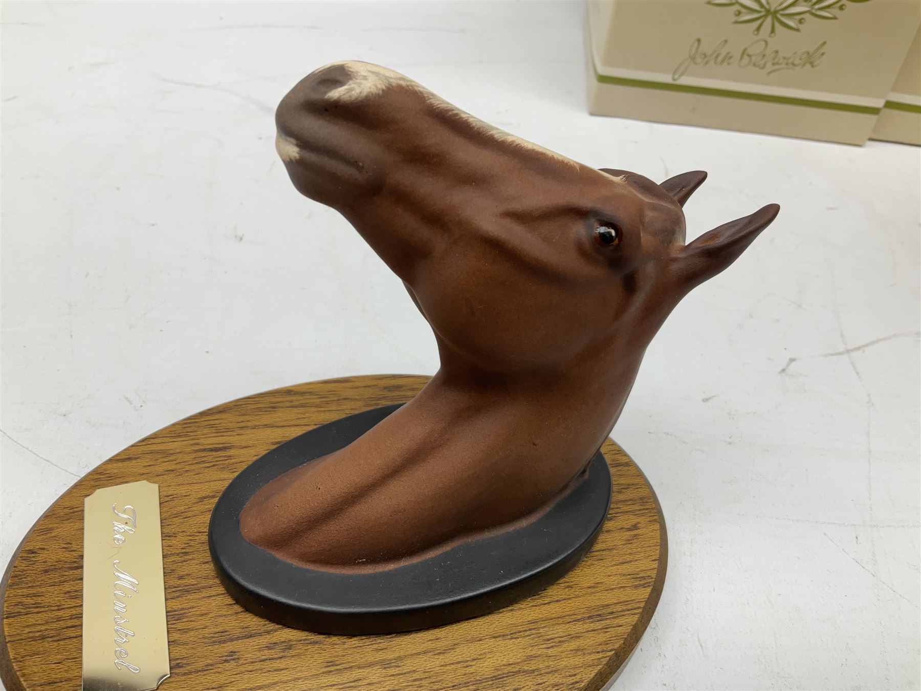 Beswick set of horse head wall plaques 'Champions all', comprising Arkle no.2700, The Minstrel no.2701, Red Rum no.2702, Troy no.2699, all with original boxes