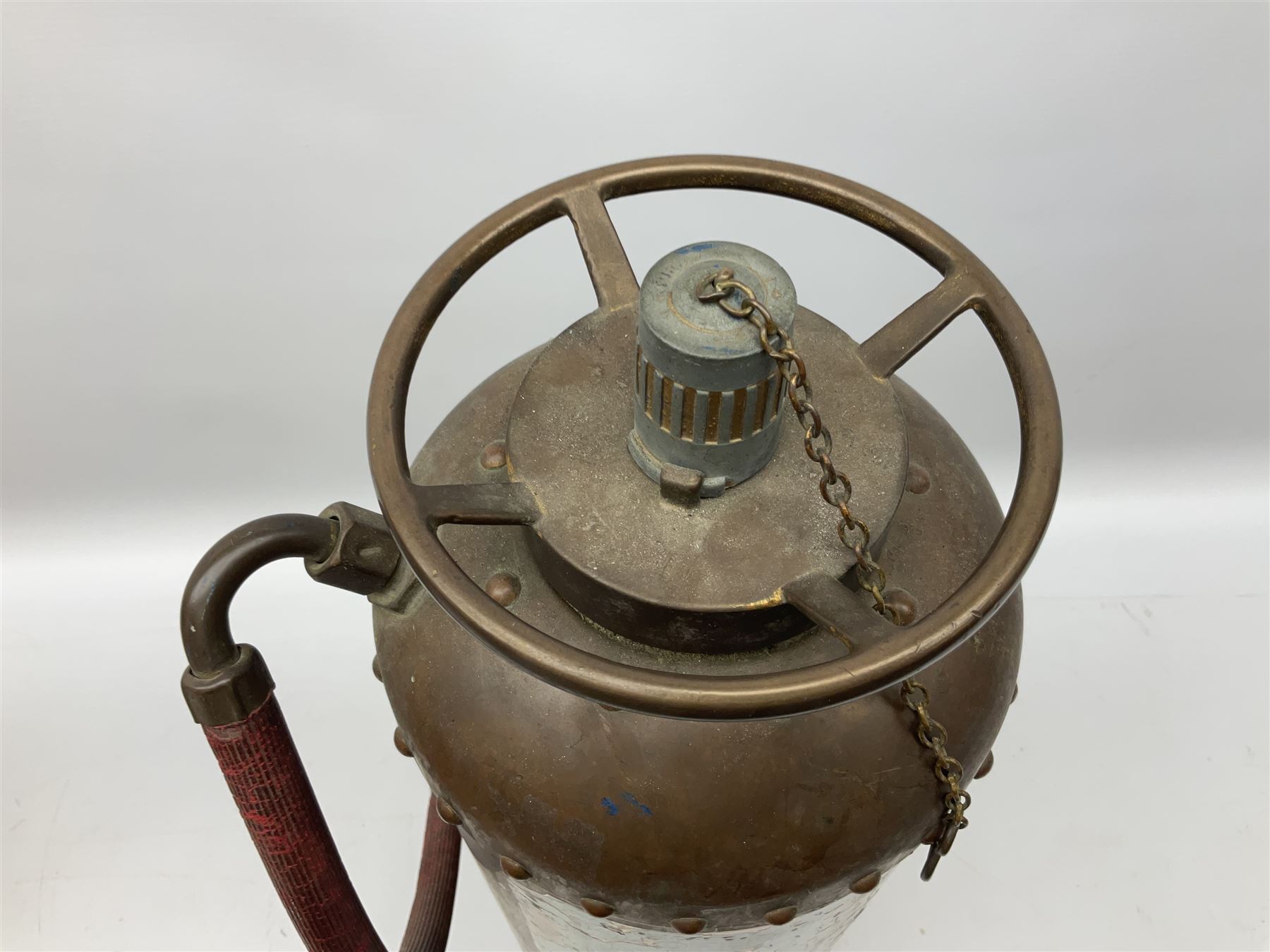 Large copper ‘Waterloo’ fire extinguisher by Read and Campbell Ltd and another Safex example 
