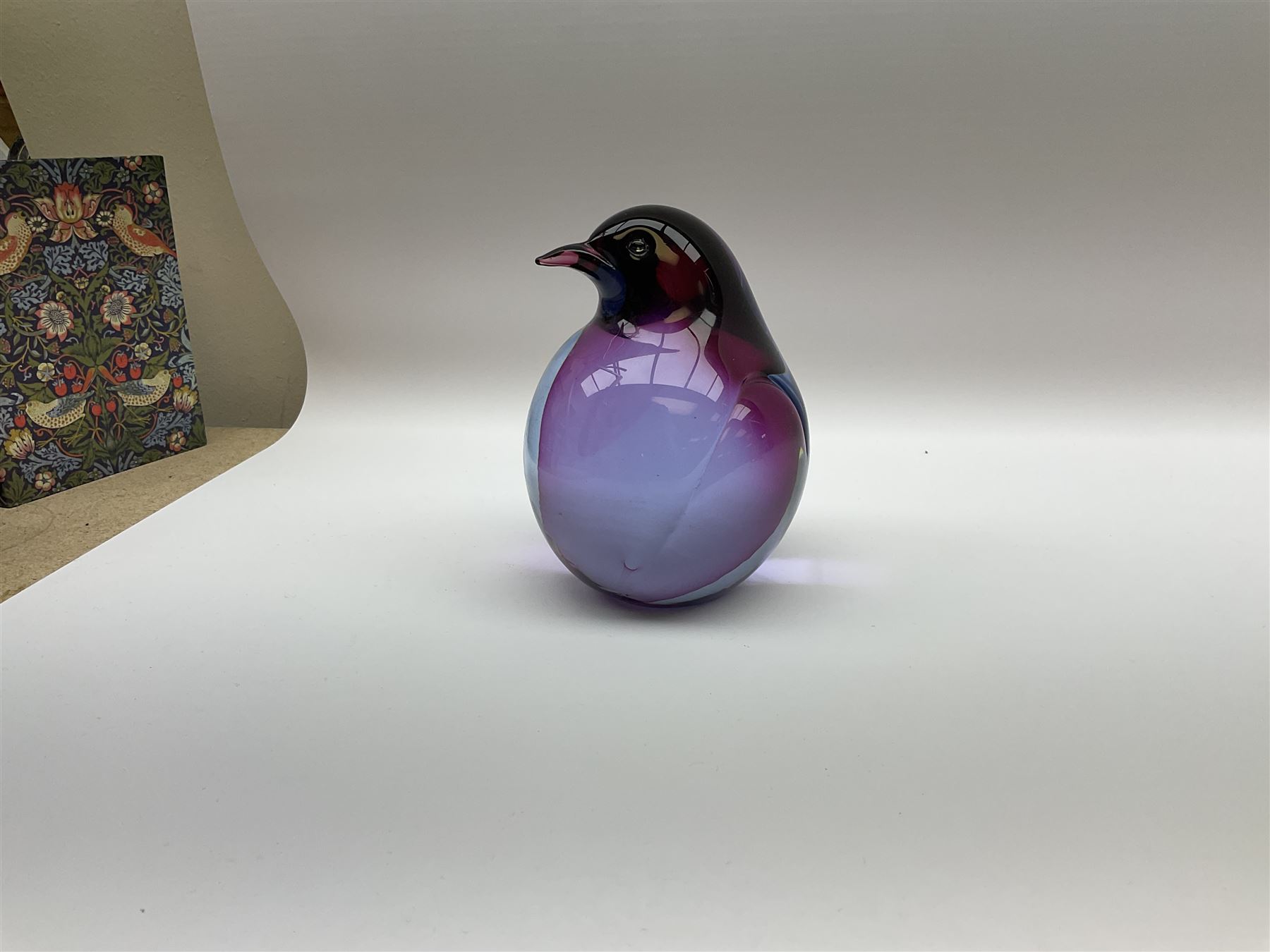 Livio Seguso (Italian, 1930-), Murano glass penguin paperweight in purple and blue, H12.5cm, together with another paperweight modelled as a polar bear for Graglas of Germany, c1970, both with etched marks beneath