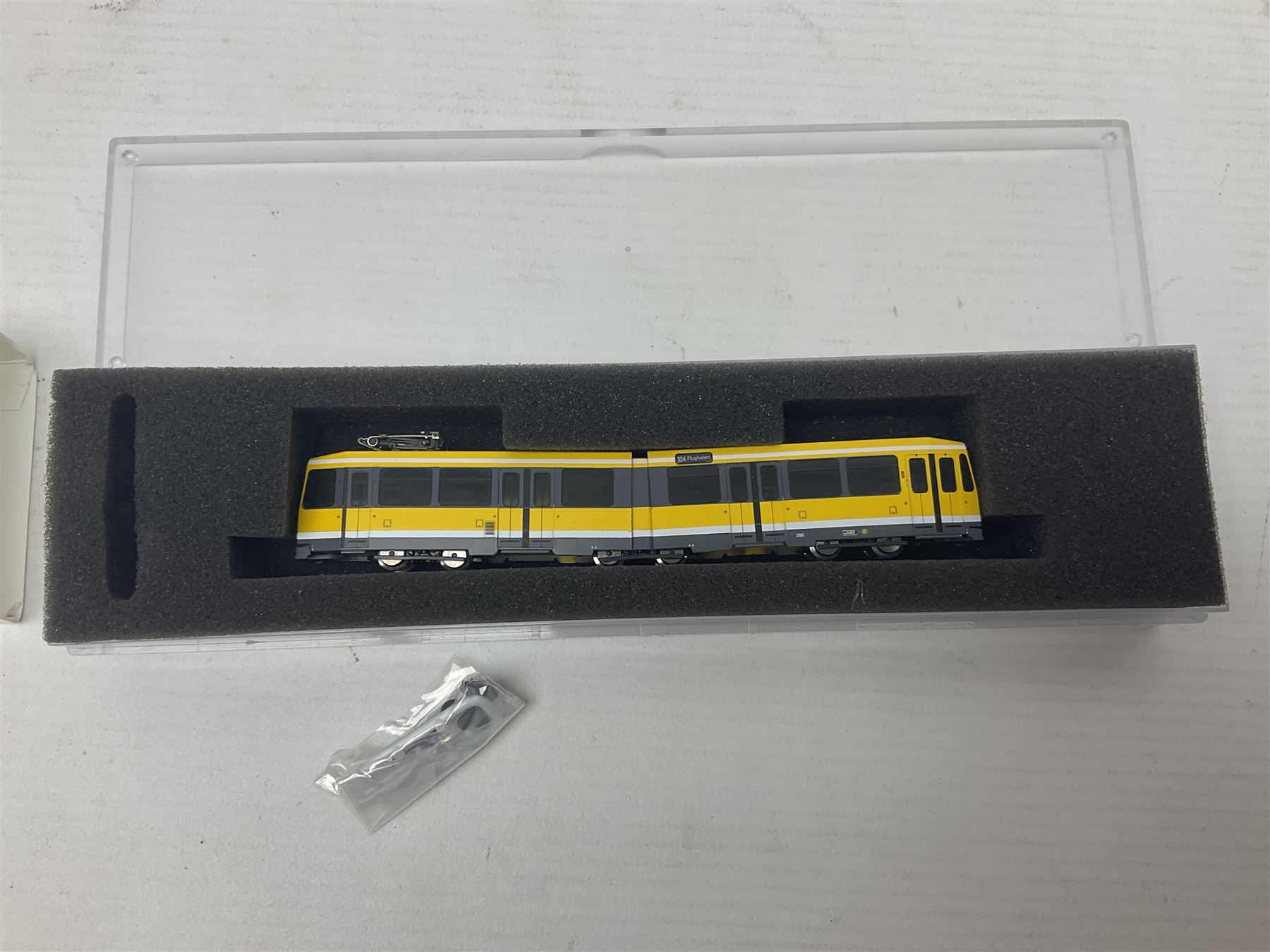 Hobbytrain 'N' gauge - three locomotives - H2970 Vectron Ep.VI CargoServ; H14902 Strassenbahn Duwag M6 Muhlheim/Ruhr; and H14903 Strassenbahn Duwag M6 Nurnberg; all boxed (3)