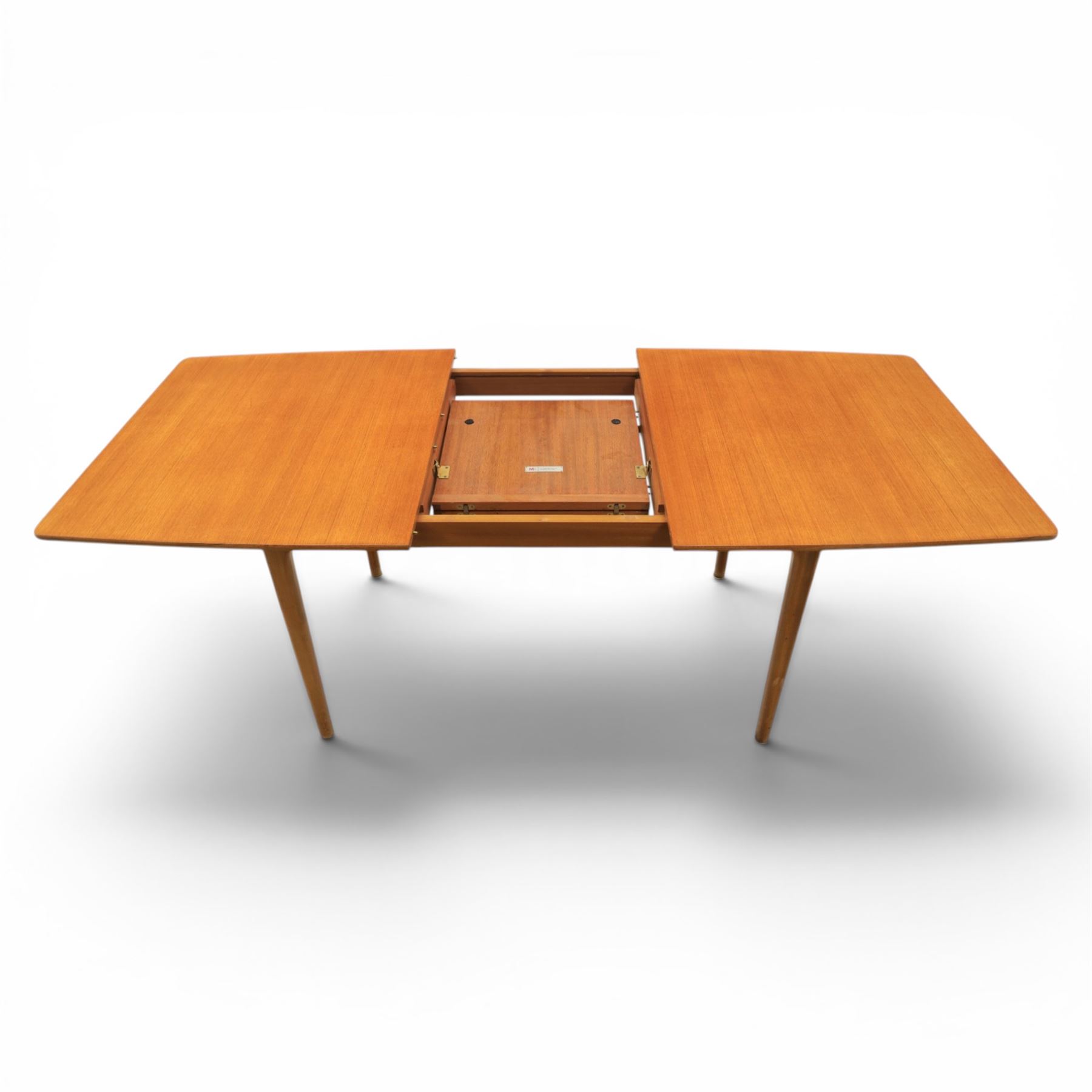 A.H. McIntosh - Mid-20th century teak extending dining table and four chairs, teak top table with internal fold over leaf extending to 193cm, raised on cylindrical tapering supports