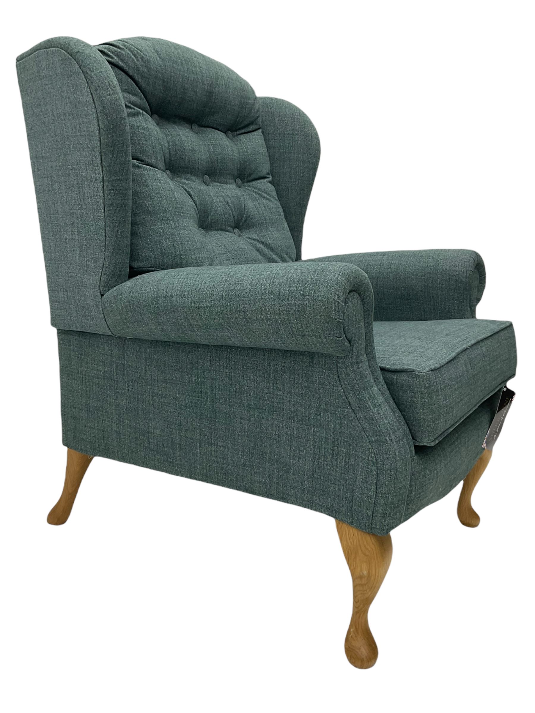 Sherborne England Lyndon fireside armchair, upholstered in Highland Baltic fabric, light oak legs