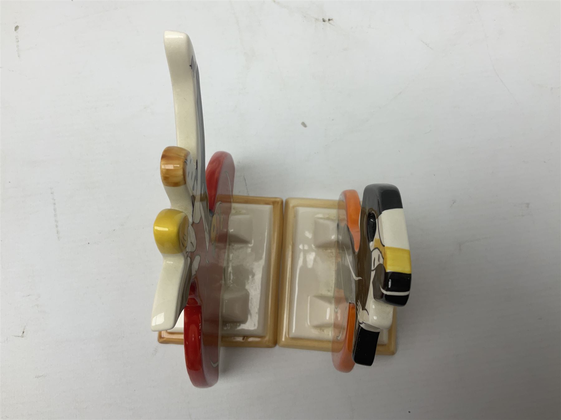 Pair of Wedgwood Clarice Cliff Bizarre 'Age of Jazz' tango dancers, with printed mark beneath, H15cm