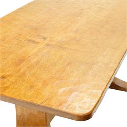 Acornman - adzed oak refectory dining table, rectangular adzed top with rounded corners raised on twin shaped end supports terminating to sledge feet united by pegged stretcher, carved with acorn signature