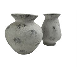 Two composite Grecian design urns or pots, in rustic white finish (D36cm & D29cm)
