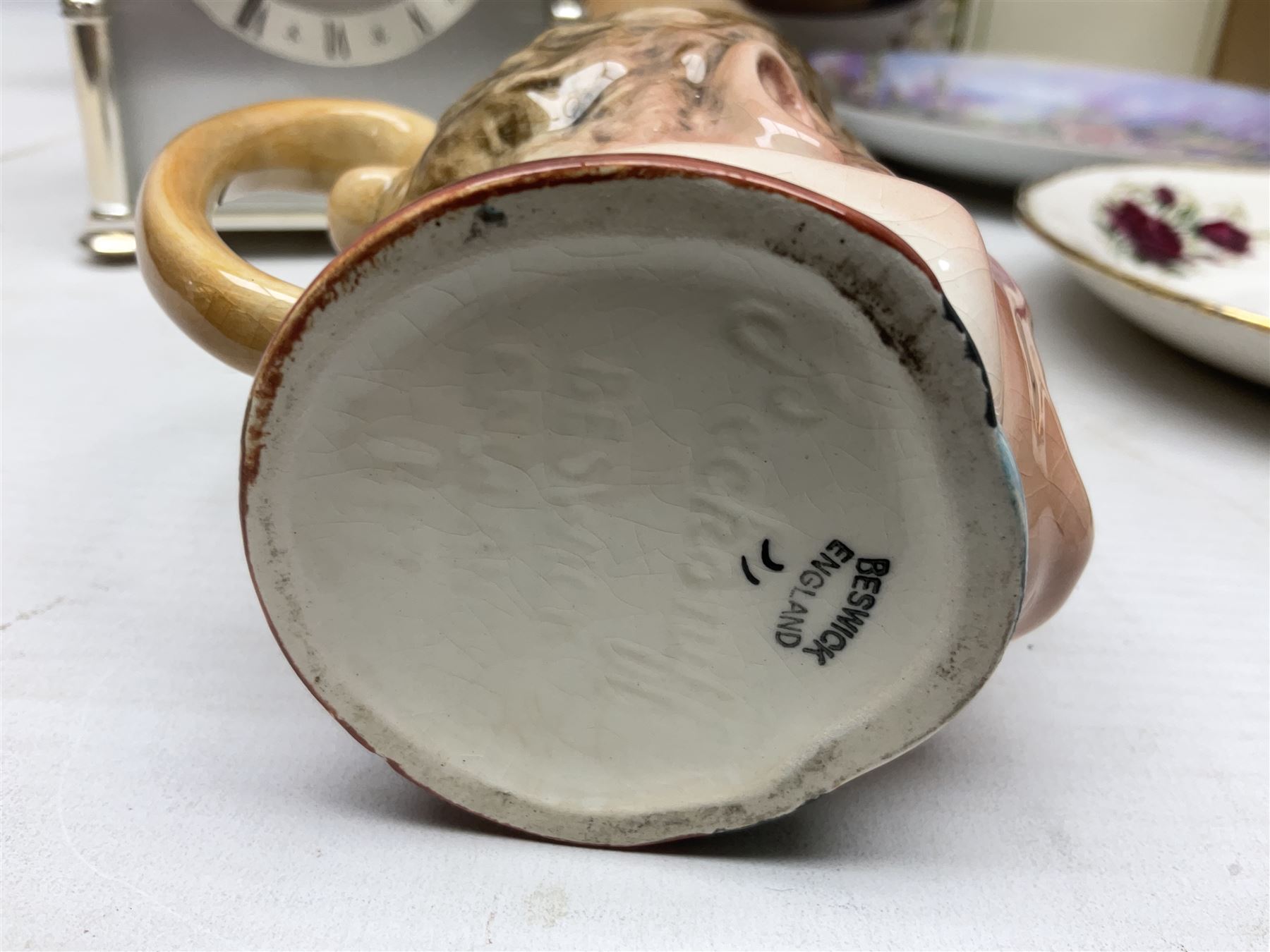 Beswick character jug, together with Leonardo Collection figures, porcelain dolls etc 