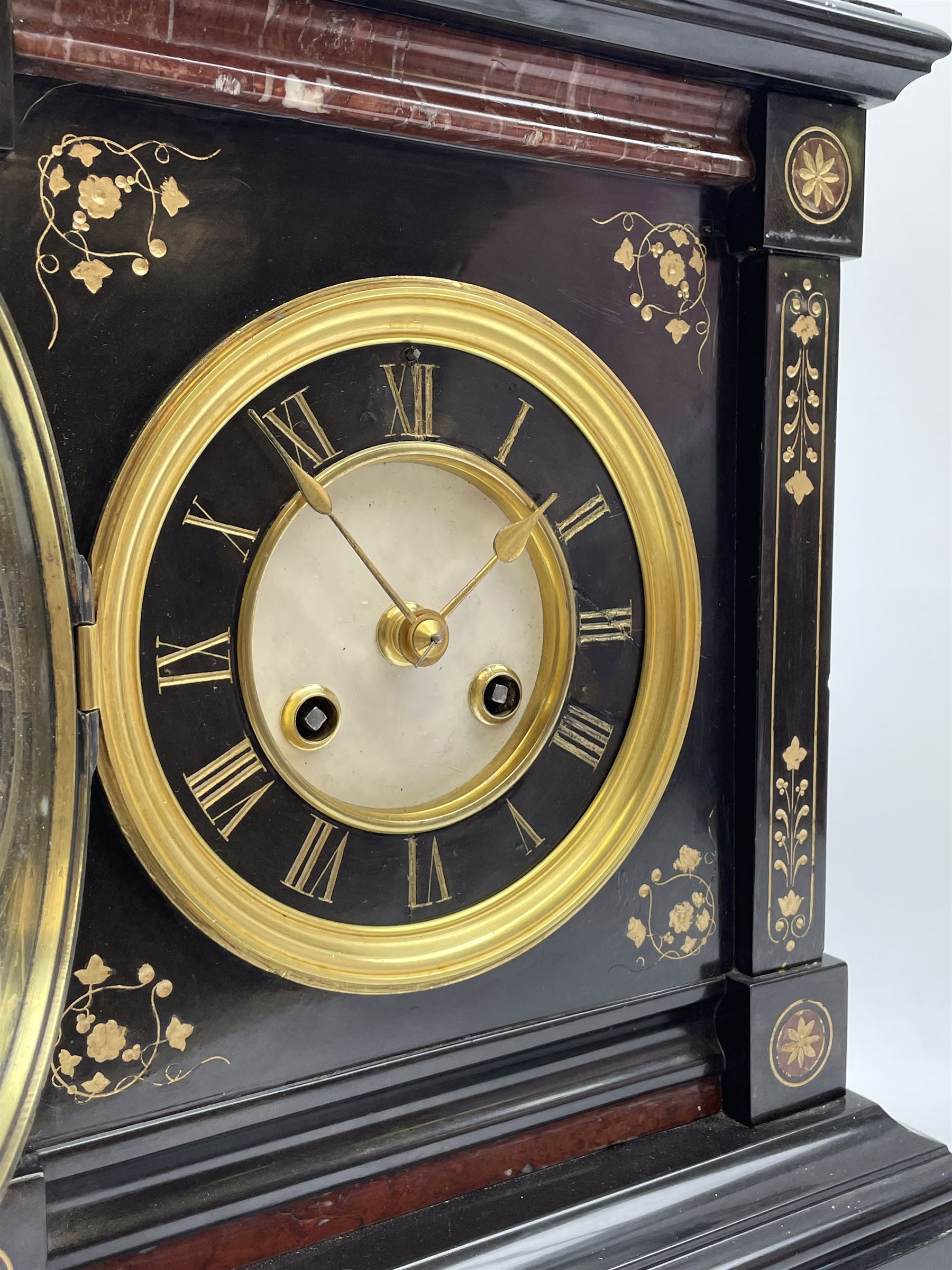 Victorian black slate cased mantel clock, with rouge marble, engraved and gilt decoration, circular dial with Roman chapter ring, twin train eight day movement with brocot escapement, striking the hours and halves on bell, the movement back plate stamped 'B.R 39549 498'