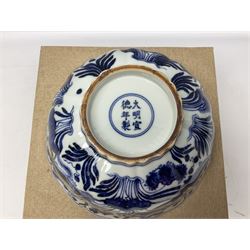 Chinese blue and white bowl, of lobed form painted with fish amidst lotus flowers, with Xuande six character mark to base, D23cm, boxed