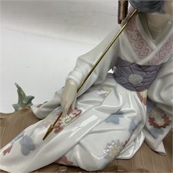 Lladro figure group, Springtime In Japan upon a plinth, modelled as two Geisha on a bridge with a crane, sculpted by Salvador Debonno, no 1445, with original box, H30cm