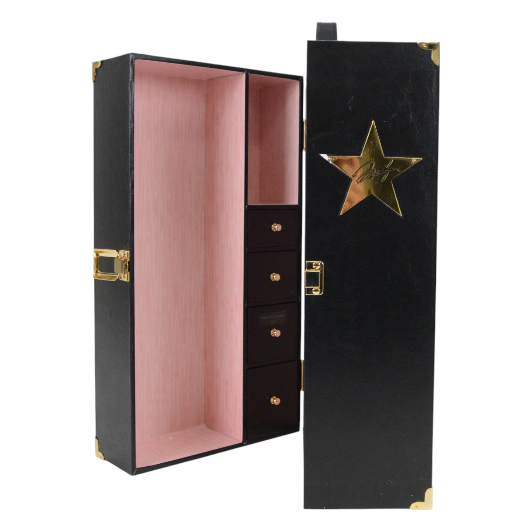 Franklin Mint Marilyn Monroe portrait doll, dressed in Gentleman Prefer Blondes pink dress, together with a wardrobe trunk and four outfits, comprising white dress from The Seven Year Itch, black dress from Some Like It Hot, red glitter dress with feather headress from The Seven Year Itch and the 'Happy Birthday Mr President' nude dress, all boxed with certificate of authenticity