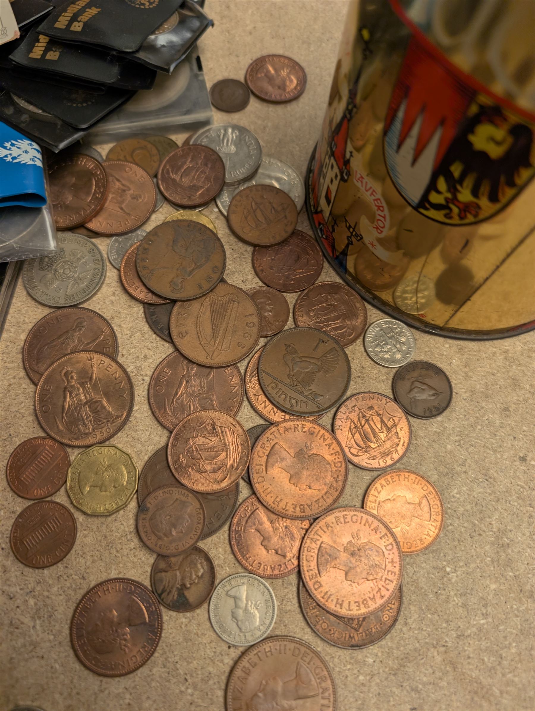 Collection of Great British and World coins, including 0.997 silver Laxmi Ganesh Krishiiamahavir Ambajishrinathji coin, American coins, commemorative coins, etc together with a silver fob medal, two Siam silver tie clips and a silver pen knife inscribed 1917