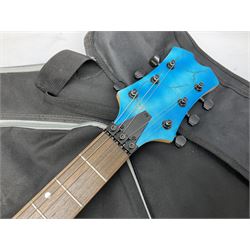 Heavy metal style electric guitar with crackled blue body L107cm; in Stagg gig bag; and Westfield electric guitar with metallic purple body L98cm; in soft carrying case (2)