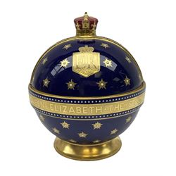 Minton Queen Elizabeth II 1953 Coronation limited edition orb designed by John Wadsworth, the dark blue ground decorated with gilt coat of arms and monogrammed ER shield, banding and stars, the lid with gilded crown finial, raised upon circular spreading foot, number 31 out of a limited issue of 50, with printed gilt marks beneath, H14.5cm