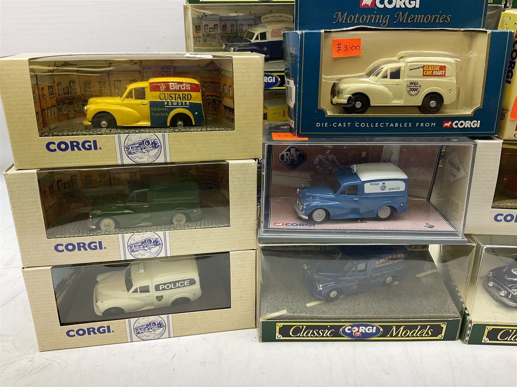 Twenty six boxed Corgi die-cast models, predominantly of Morris Minor vans, to include boxed limited edition Morris Minor van set, Morris Minor Saloon, Morris 100 Van with Bird's Custard livery, Royal Mail Morris Mini van etc
